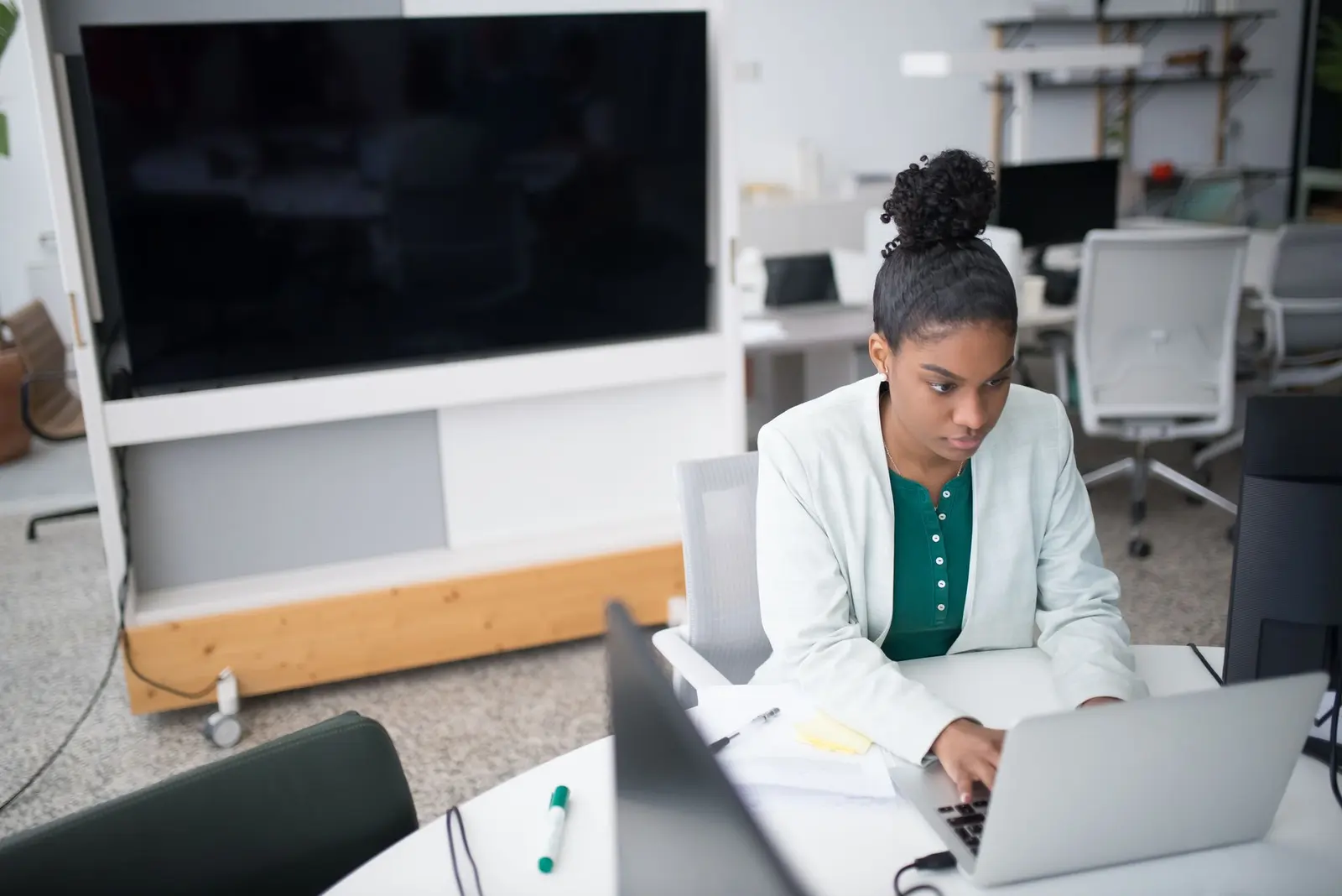 Business owner reviewing her website’s Google search performance on a computer