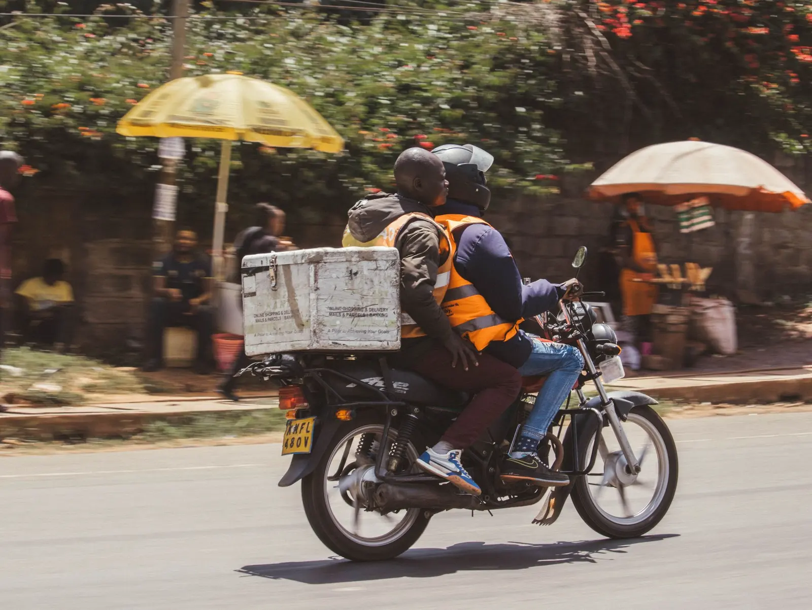 A boda boda rider delivering an online order in Nairobi